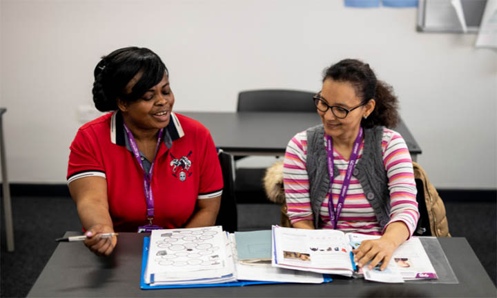 A tutor helping a student 